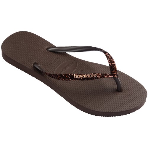 Chinelo marrom com tiras brilhantes e logo Havaianas, conforto e estilo para o dia a dia.